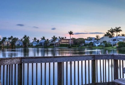 balcony overlooking lakefront neighborhood in naples, fl