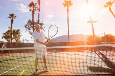 Playing tennis at Pelican Sound