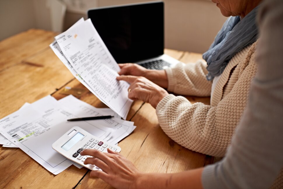 Person reviewing mortgage documents during the home loan process