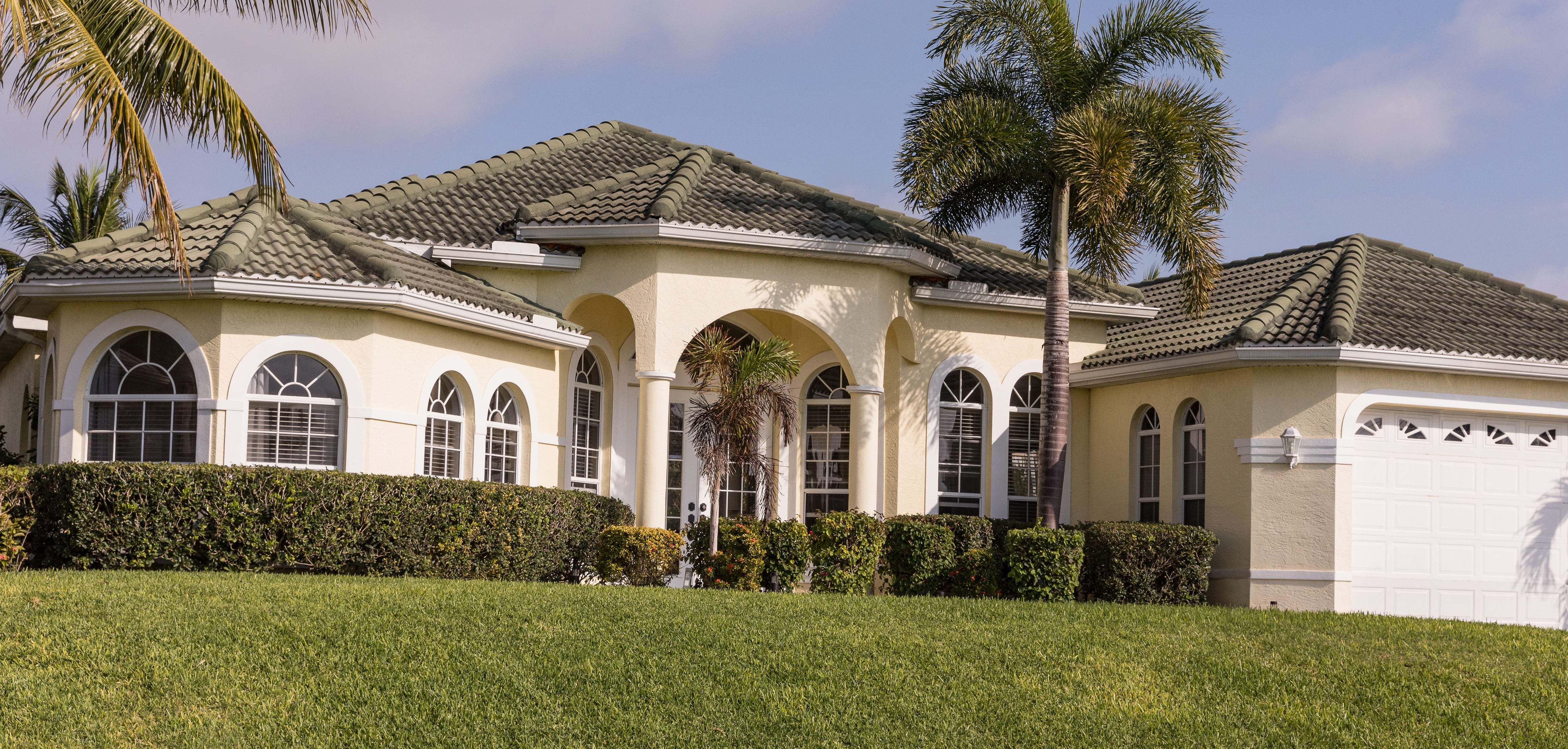 Typical Mediterranean-inspired luxury home in Imperial Golf Estates, FL.